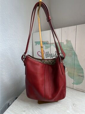 Vintage Coach Legacy slim duffle red with silver tone hardware